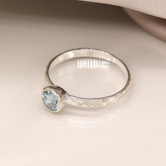 Sterling Silver Hammered Ring with Blue Topaz